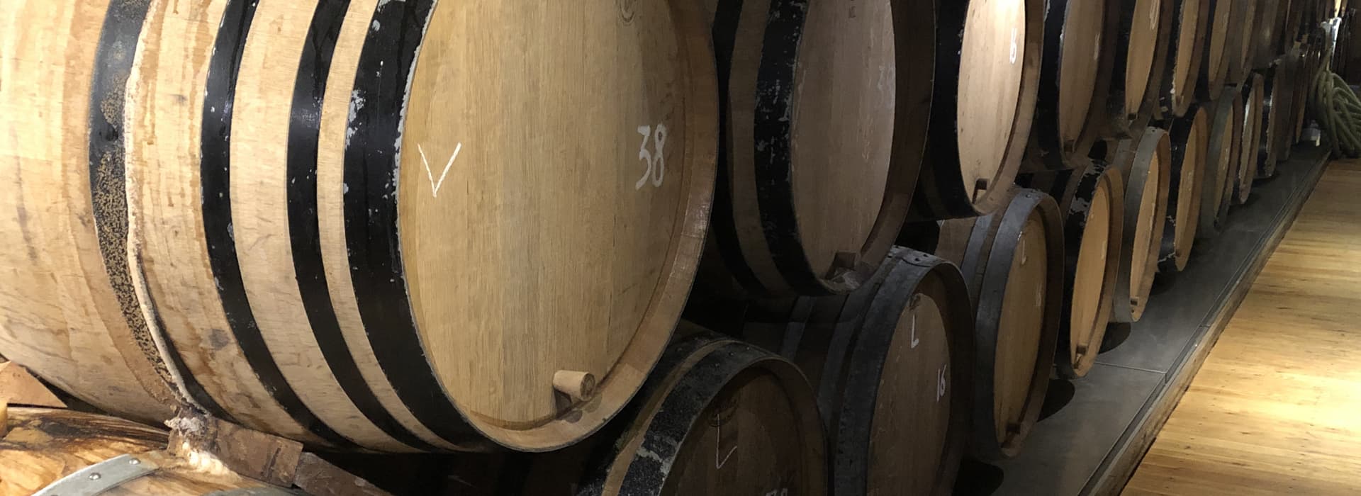 Lambic aging in barrels at Cantillon