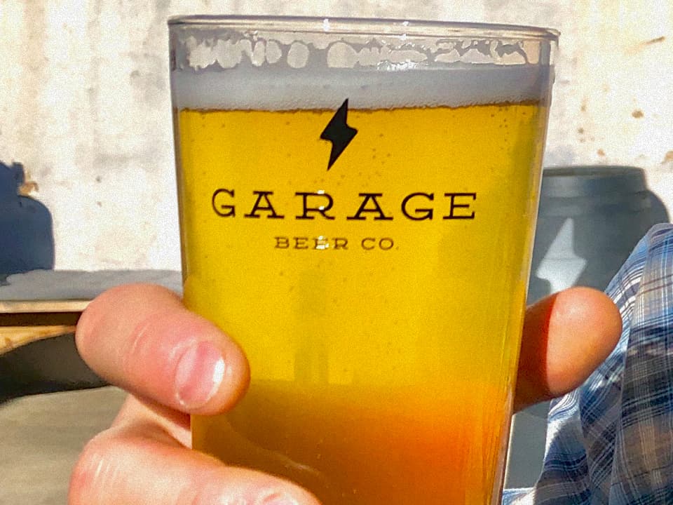 A pint of Garage beer on a sunny day.