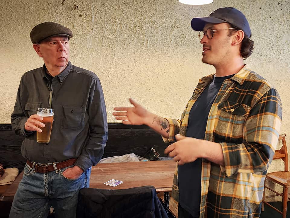 Ted listens intently as Gordon Mackenzie talks about brewing at Newbarns.(EDINBURGH, SCOTLAND)