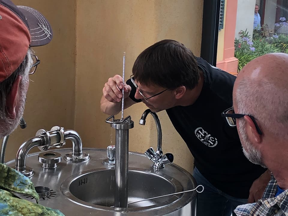 Stephan checks the gravity of his latest brew at Brauerei Zehendner.